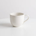 Minimalist white porcelain cup – Elegant mug for coffee and tea